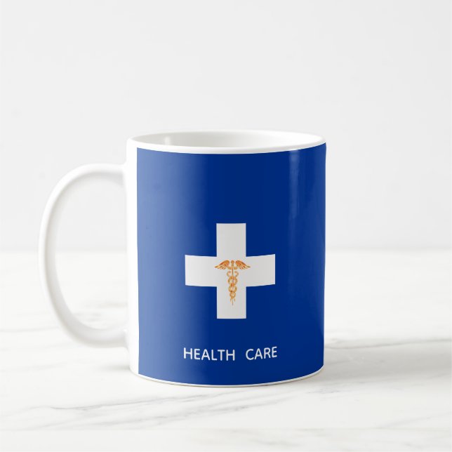 Health Care White Cross, Golden Caduceus on Blue Coffee Mug (Left)