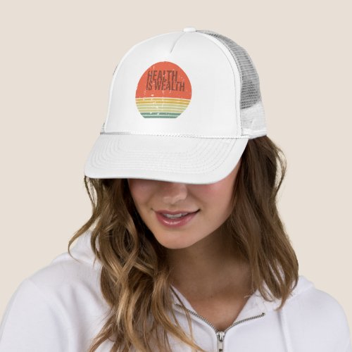 Health is wealth vintage trucker hat