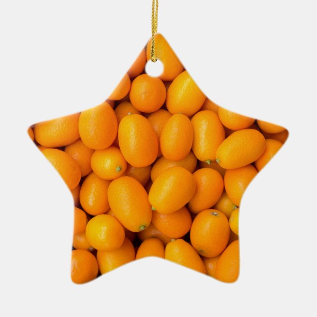 Heap of orange kumquats in cardboard box ceramic ornament (Front)