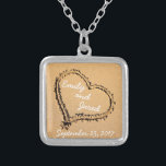 Heart in Sand Custom Couple Wedding Date Necklace<br><div class="desc">This cute necklace features an image of a heart drawn in the sand with the name of the happy couple on it. Personalize it with your names or the names of the couple you are purchasing it for. Underneath the heart is where you can put the Wedding or Engagement date....</div>