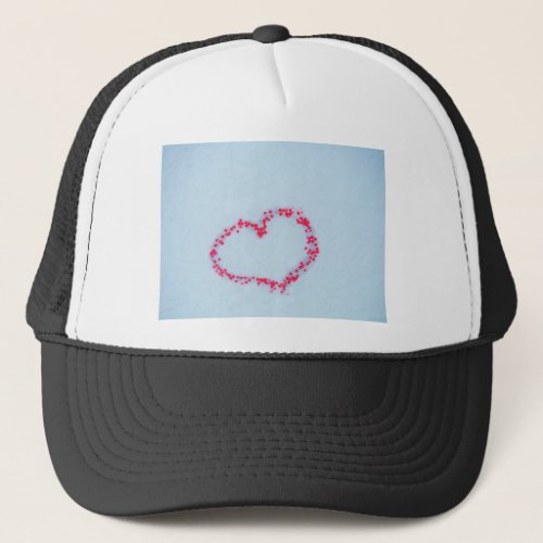 heart in the snow made of Red holly berries Trucker Hat