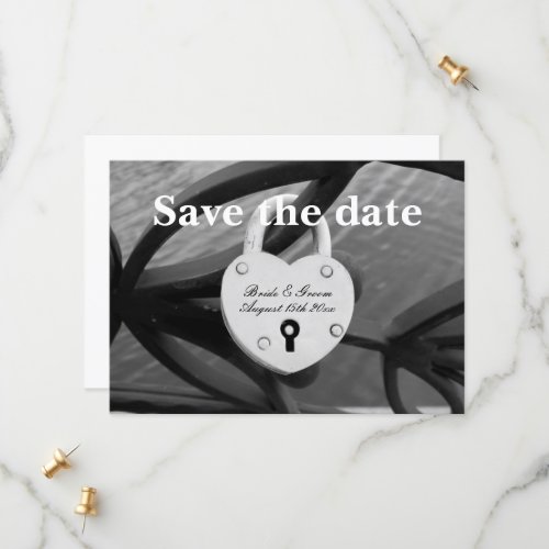 Heart shape padlock on fence photo wedding save the date