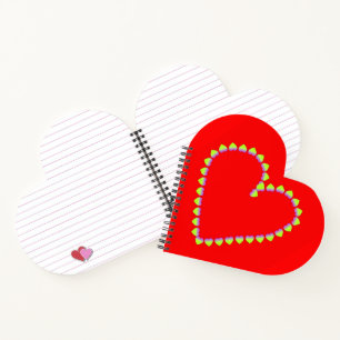 Heart shaped hearts on red notebook