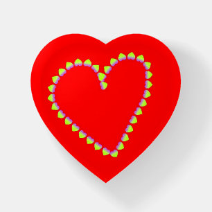 Heart shaped hearts on red paperweight