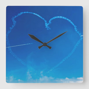 Heart-shaped plane trails square wall clock