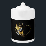 Heart with Golden Butterflies Teapot<br><div class="desc">Gold heart shaped frame,  decorated with gold,  jewelry and white butterflies on black background.</div>