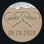 Hearts in the Sand Beach Shore Wedding Favor Classic Round Sticker<br><div class="desc">Hearts in the Sand Beach Shore Wedding Favor Stickers - use these to dress up envelopes, use on various items at your reception and more. Design features hearts in the sand that you can "carve" or "write" your own names into. The back has a matching sand background. See the full...</div>