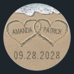 Hearts in the Sand Beach Shore Wedding Favor Classic Round Sticker<br><div class="desc">Hearts in the Sand Beach Shore Wedding Favor Stickers - use these to dress up envelopes, use on various items at your reception and more. Design features hearts in the sand that you can "carve" or "write" your own names into. The back has a matching sand background. See the full...</div>
