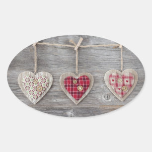 Hearts over a Wooden Table Oval Sticker