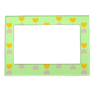 Hearts shapes on light green magnetic frame
