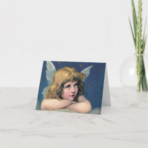 Heavenly angel daydreaming on a cloud in the sky card
