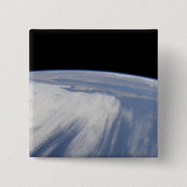 Heavy cloud cover over the Pacific Ocean Button (Front)