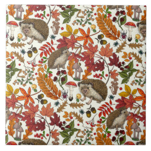 Hedgehogs and autumn forest flora on ivory ceramic tile