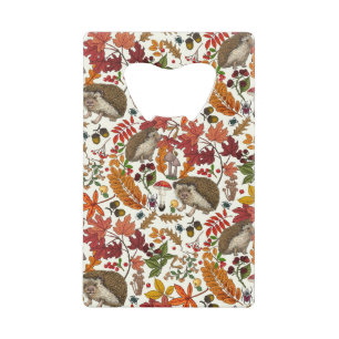 Hedgehogs and autumn forest flora on ivory credit card bottle opener