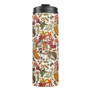 Hedgehogs and autumn forest flora on ivory thermal tumbler
