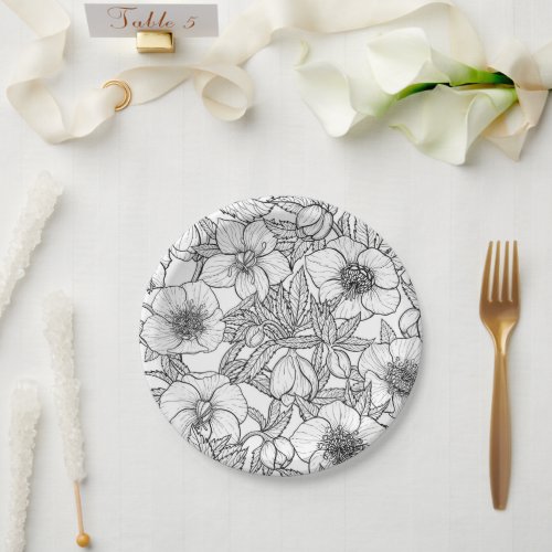 Hellebores in black and white paper plates