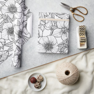 Hellebores in black and white wrapping paper