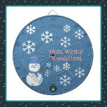 Hello, Winter Wonderland Dart Board<br><div class="desc">A Slice of Life and Delight presents a Winter Wonderland dartboard featuring a snowman decorated with white snowflakes,  pink writing,  and a blue backdrop. The snowman dart board also features a blue hat and scarf.</div>