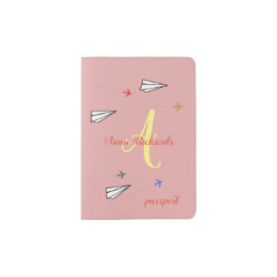 her pink passport holder of airplanes