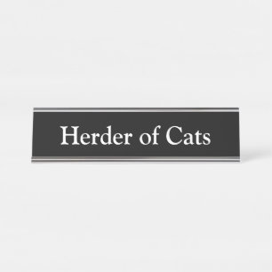 Herder of Cats, Desk Name Plate