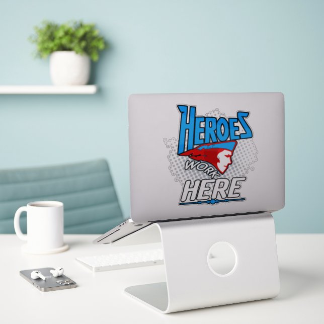 Heroes work here Vinyl Sticker (Laptop On Desk)