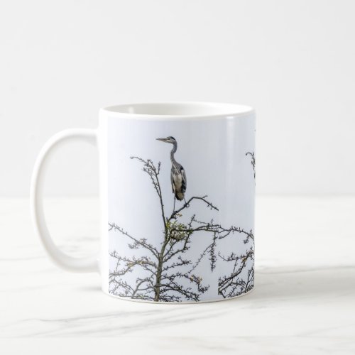 Heron on a tree coffee mug