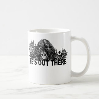 HEs OUT THERE coffee mug