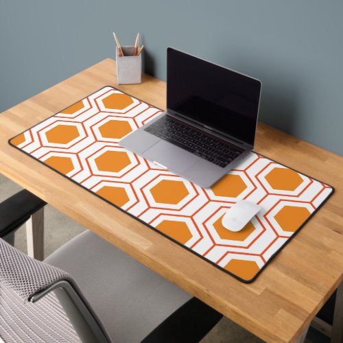 Hexagon abstract geometrical pattern in orange and desk mat