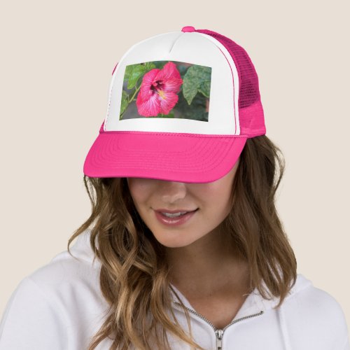 hibiscus in bloom in the garden trucker hat