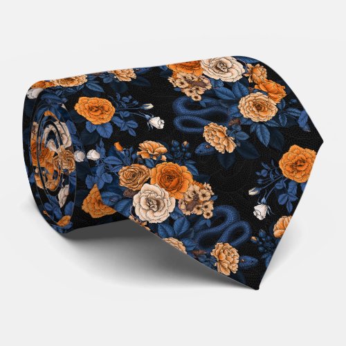 Hidden in the roses orange and blue neck tie