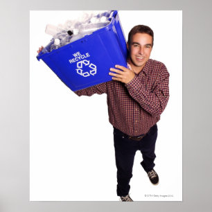 High angle of a man smiling while holding a poster