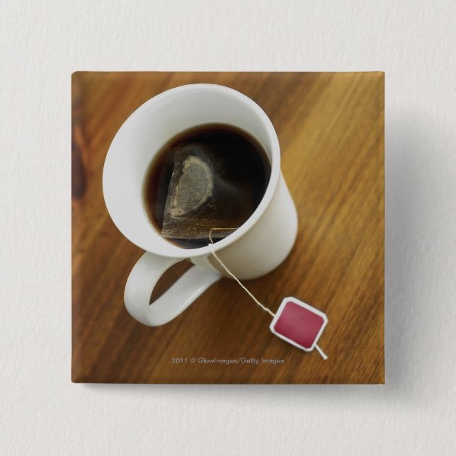 High angle view of a cup of tea pinback button (Front)