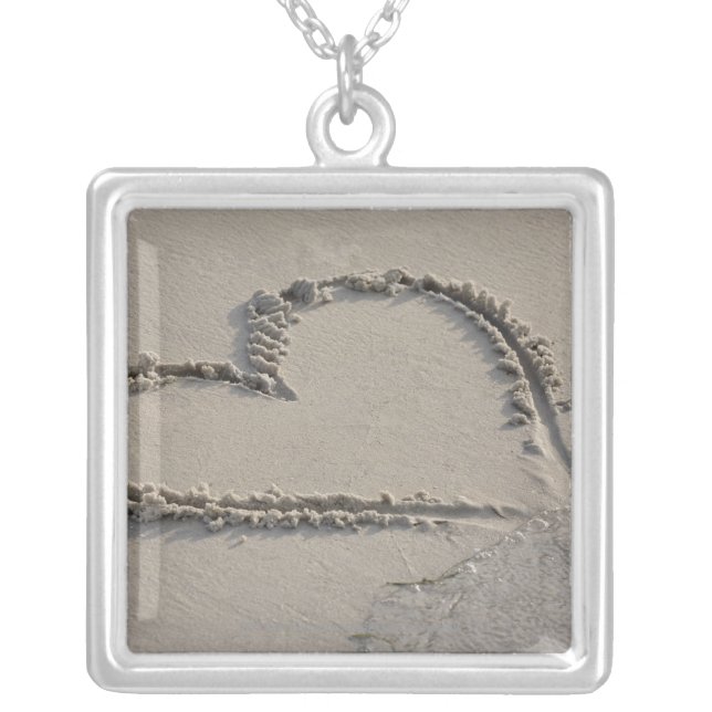 High angle view of a heart shape on the beach silver plated necklace (Front)