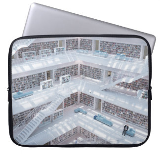 HIGH-RAISE PHOTOGRAPHY OF LIBRARY LAPTOP SLEEVE