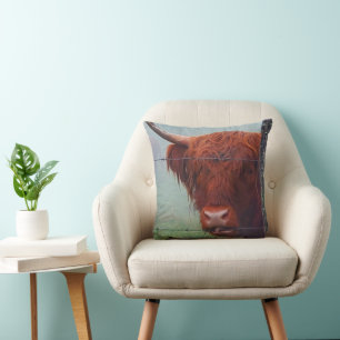 Highland Cow Biting A Wire Fence Throw Pillow