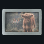 Highland cow calf autumn grass monogram initial belt buckle<br><div class="desc">Highland cow calf autumn grass field photograph. Stunning young calf of highland scottish cattle on an autumn grassy field with muted colors. Beautiful dark hairy orange coat contrasting with light yellow green grass and trees in bokeh in background. Custom personalizable monogram with your name and inital on the left.</div>