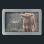 Highland cow calf autumn grass monogram initial belt buckle<br><div class="desc">Highland cow calf autumn grass field photograph. Stunning young calf of highland scottish cattle on an autumn grassy field with muted colors. Beautiful dark hairy orange coat contrasting with light yellow green grass and trees in bokeh in background. Custom personalizable monogram with your name and inital on the left.</div>