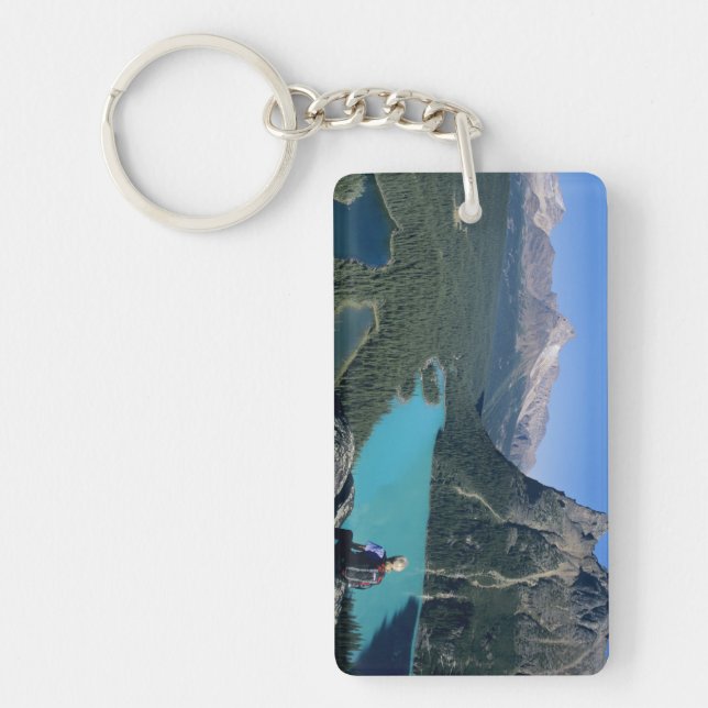 Hiker overlooking turquoise-colored Lake Keychain (Front)
