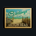 Hilton Head Beach Vintage Travel Magnet<br><div class="desc">This Greetings From Hilton Head vintage postcard design features a sandy beach with a beautiful turquoise ocean water and above the sea,  a blue sky with billowy white clouds. In vintage travels style.</div>