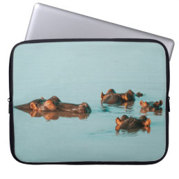 HIPPOS COOLING OFF IN THE DAM LAPTOP SLEEVE