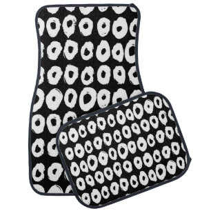 Hipster style pattern with doughnut like shapes in car floor mat
