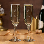 His and Hers Name and Monogram Champagne Flute<br><div class="desc">His name on one glass. Her name on the other glass. Their newly shared initial in a monogram circle frame.</div>