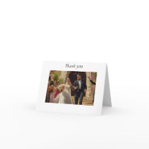 Hispanic couple leaves church after wedding