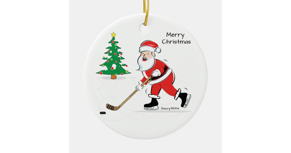 Santa Playing  Ice Hockey Glass Christmas Ornament