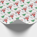 Hockey Santa Christmas Wrapping Paper<br><div class="desc">Wrap up their Christmas gifts with a hockey playing santa.</div>