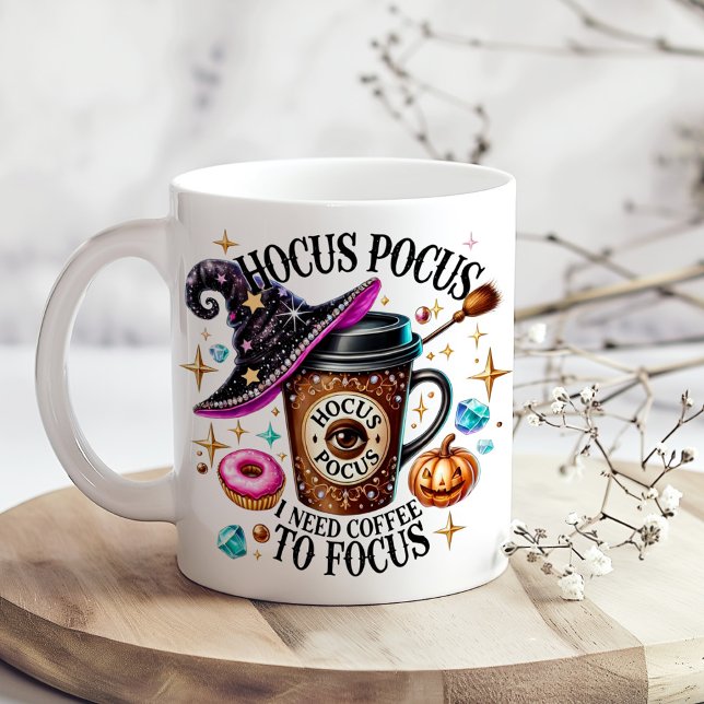 "Hocus Pocus I Need Coffee" Funny Witchy  Giant Coffee Mug ("Hocus Pocus I Need Coffee" Funny Witchy Giant Coffee Mug on a kitchen table with tiny dry flowers)