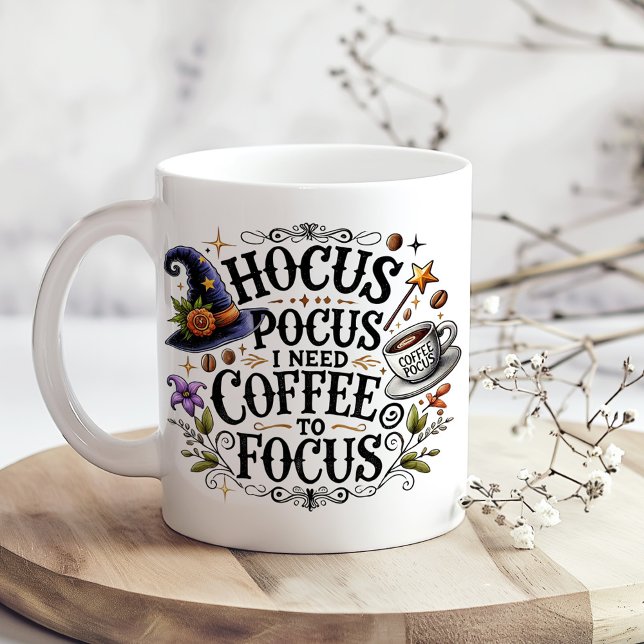 "Hocus Pocus I Need Coffee to Focus" Giant Coffee Mug ("Hocus Pocus I Need Coffee" Funny Witchy Giant Coffee Mug on a kitchen table with tiny dry flowers)