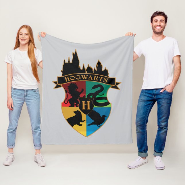 HOGWARTS™ Castle Crest House Pride Badge Fleece Blanket (In Situ)
