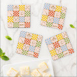 HOGWARTS™ QUIDDITCH™ Team Checker Pattern Coaster Set<br><div class="desc">Celebrate the magic of the wizarding world with this charming checkered icon pattern design. Featuring a playful patchwork of house-inspired colors, broomsticks, magical balls, crests, and other wizarding symbols, this all-over print blends classic charm with whimsical detail. The alternating checkerboard layout gives the design a cozy, quilt-like feel, while the...</div>