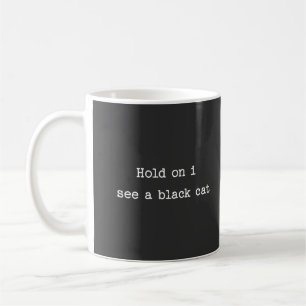 Hold on I see a Black Cat Coffee Mug